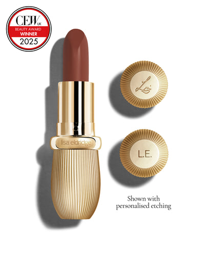 Mauve-y chocolate coloured lipstick with gold vintage-style casing and 'Lisa Eldridge' branding on a white background, featuring a CEW Beauty Award 2025 badge.