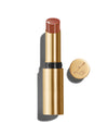 Baume Embrace in Sweet Fig, a pink-brown lip colour with a gold-colored casing, next to the Lisa Eldridge logo-embossed lid