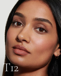 block The white pod packaging of Seamless Skin Enhancing Tint by Lisa Eldridge