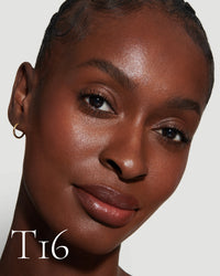 block The white pod packaging of Seamless Skin Enhancing Tint by Lisa Eldridge