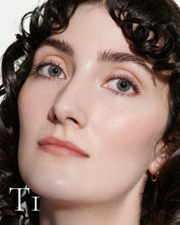 block The white pod packaging of Seamless Skin Enhancing Tint by Lisa Eldridge