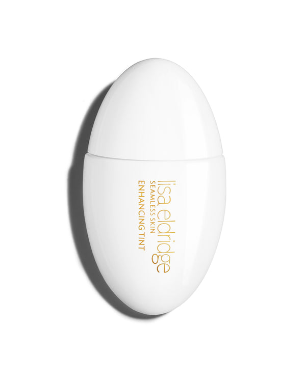 The white pod packaging of Seamless Skin Enhancing Tint by Lisa Eldridge